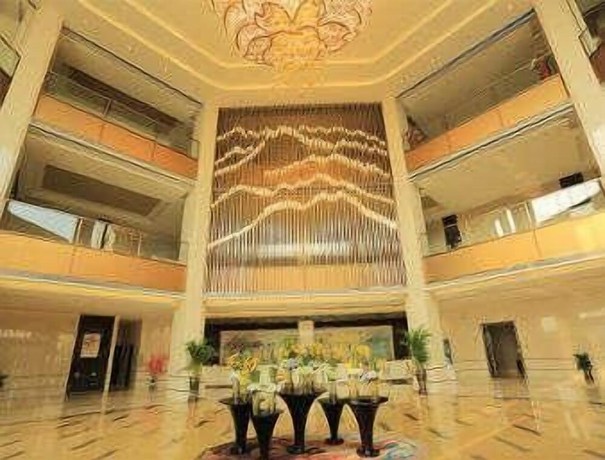 Imagen de los interiores del Hotel Ramada by Wyndham Yiyang Taojiang. Foto 18