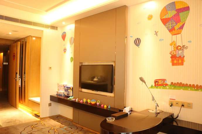 Imagen de la habitación del Hotel Ramada by Wyndham Yiyang Taojiang. Foto 15