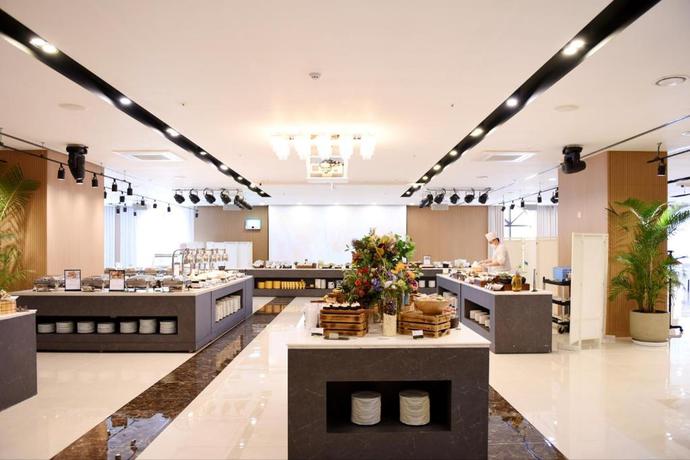 Imagen del bar/restaurante del Hotel Ramada by Wyndham Yongin. Foto 3