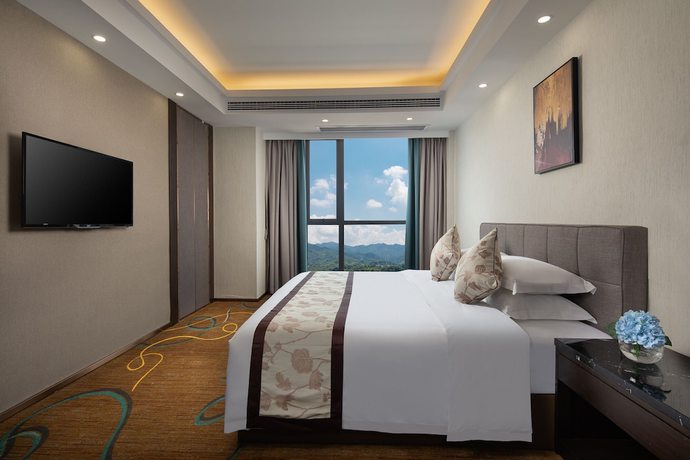 Imagen de la habitación del Hotel Ramada by Wyndham Zhangjiajie. Foto 2