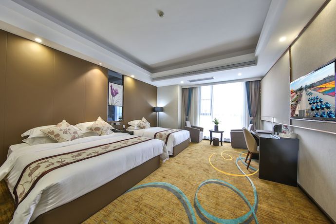 Imagen de la habitación del Hotel Ramada by Wyndham Zhangjiajie. Foto 8