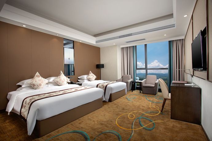 Imagen de la habitación del Hotel Ramada by Wyndham Zhangjiajie. Foto 12