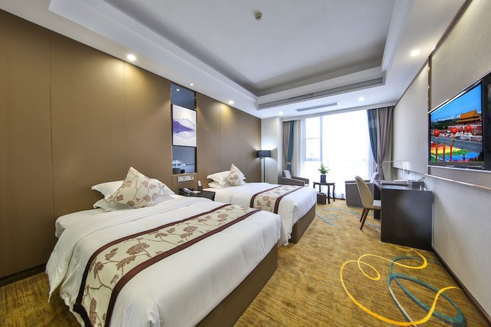 Imagen de la habitación del Hotel Ramada by Wyndham Zhangjiajie. Foto 16