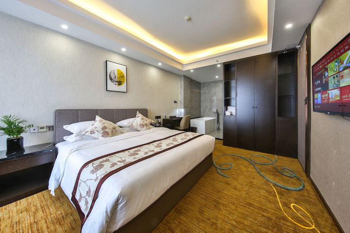 Imagen de la habitación del Hotel Ramada by Wyndham Zhangjiajie. Foto 18