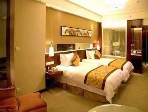 Imagen de la habitación del Hotel Ramada by Wyndham Zibo. Foto 8