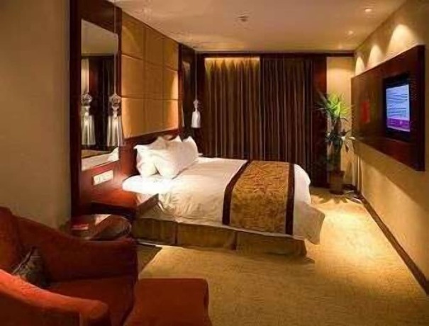 Imagen de la habitación del Hotel Ramada by Wyndham Zibo. Foto 9