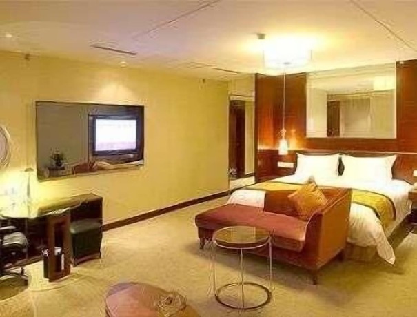 Imagen de la habitación del Hotel Ramada by Wyndham Zibo. Foto 10