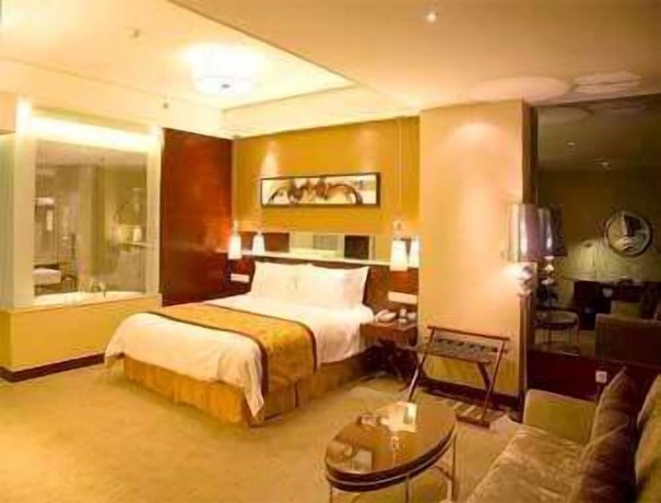 Imagen de la habitación del Hotel Ramada by Wyndham Zibo. Foto 11