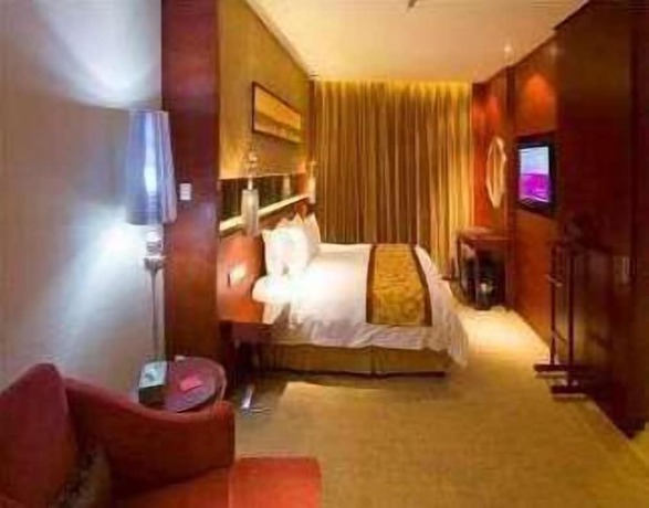 Imagen de la habitación del Hotel Ramada by Wyndham Zibo. Foto 12