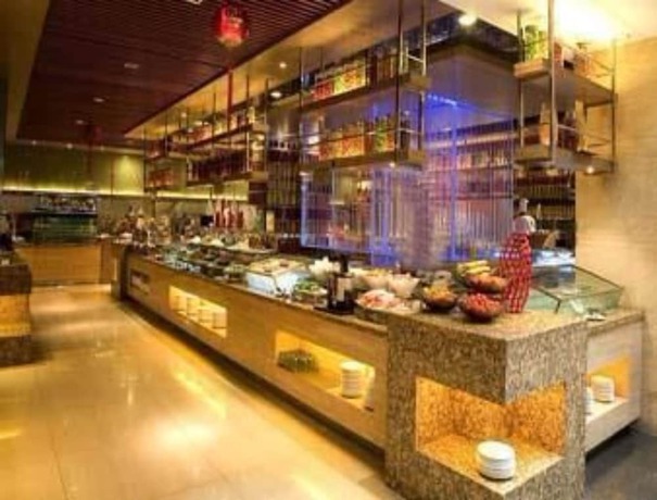 Imagen del bar/restaurante del Hotel Ramada by Wyndham Zibo. Foto 6