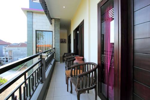 Imagen de la habitación del Hotel Ramantika Bali House. Foto 5