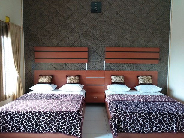Imagen de la habitación del Hotel Ramayana Garut. Foto 11