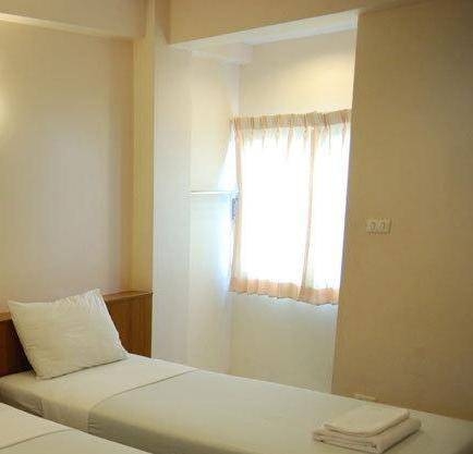 Imagen de la habitación del Hotel Rambuttri House. Foto 21