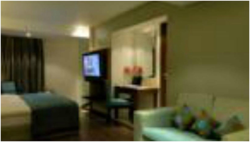 Imagen de la habitación del Hotel Ramee Guestline Juhu. Foto 6
