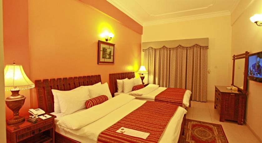 Imagen de la habitación del Hotel Ramee Palace. Foto 2