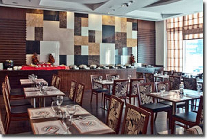 Imagen del bar/restaurante del Hotel Ramee Rose. Foto 3