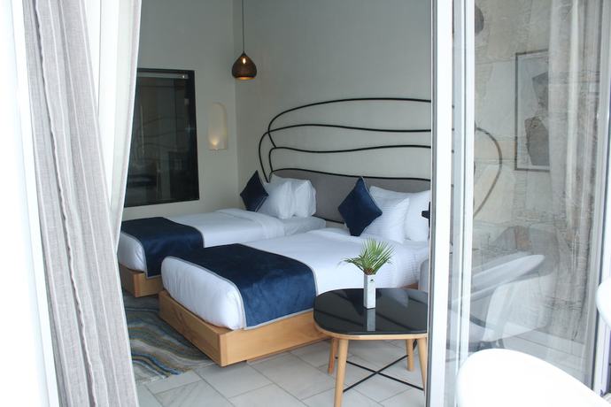 Imagen de la habitación del Hotel Ramee Royal Resort and Spa Udaipur. Foto 4