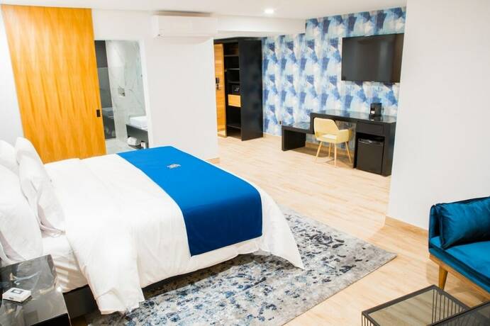 Imagen de la habitación del Hotel Ram&euml; Boutique. Foto 16