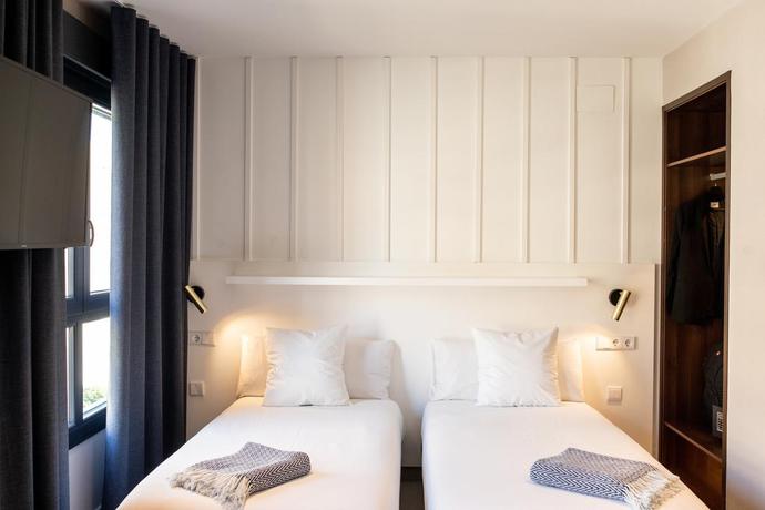 Imagen de la habitación del Hotel Ramírez Flats Valencia. Foto 8