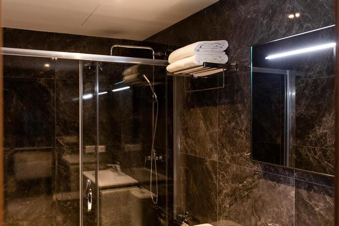 Imagen de la habitación del Hotel Ramírez Flats Valencia. Foto 9