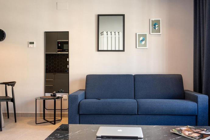 Imagen de la habitación del Hotel Ramírez Flats Valencia. Foto 11