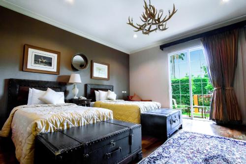 Imagen de la habitación del Hotel Rancho Charnvee Khaoyai. Foto 7