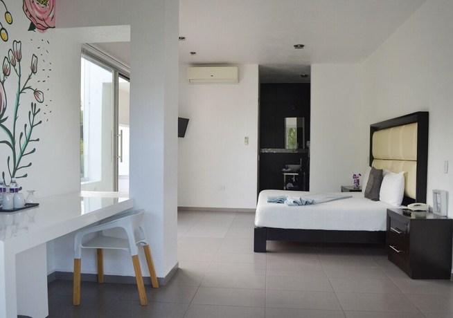 Imagen de la habitación del Hotel Rancho Macloy Spa and Social Events. Foto 4