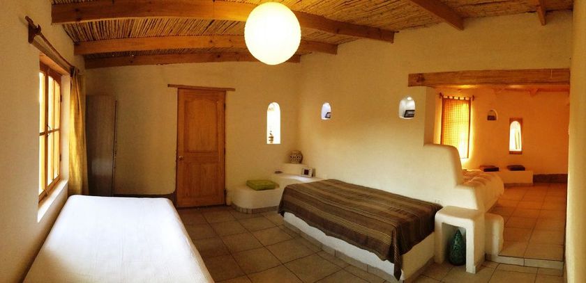 Imagen de la habitación del Hotel Rancho Quitapenas Bungalows. Foto 2