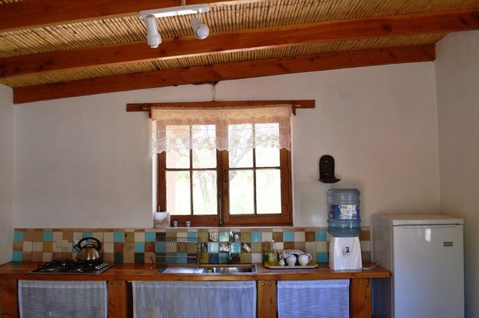 Imagen de la habitación del Hotel Rancho Quitapenas Bungalows. Foto 3
