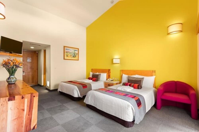 Imagen de la habitación del Hotel Rancho San Diego Grand Spa Resort. Foto 7