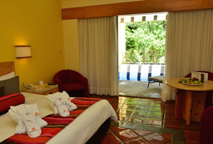 Imagen de la habitación del Hotel Rancho San Diego Grand Spa Resort. Foto 9