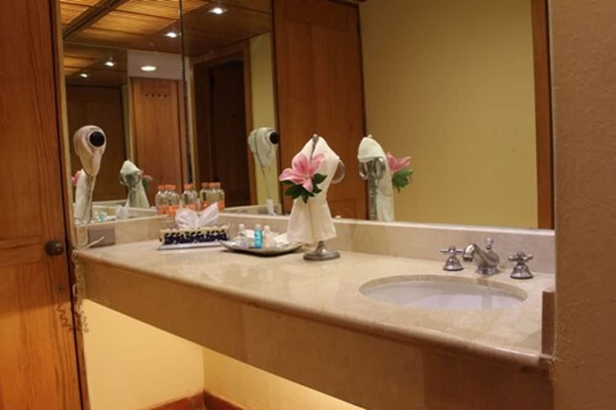 Imagen de la habitación del Hotel Rancho San Diego Grand Spa Resort. Foto 12