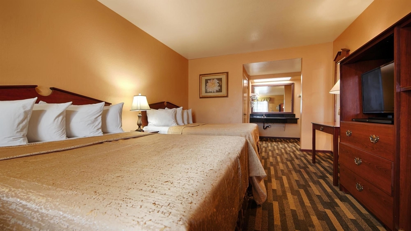 Imagen de la habitación del Hotel Rancho San Diego Inn and Suites. Foto 3