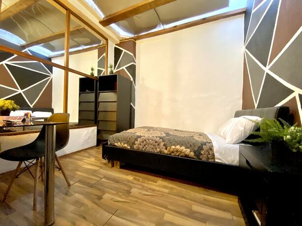 Imagen de la habitación del Hotel RandA. Foto 13