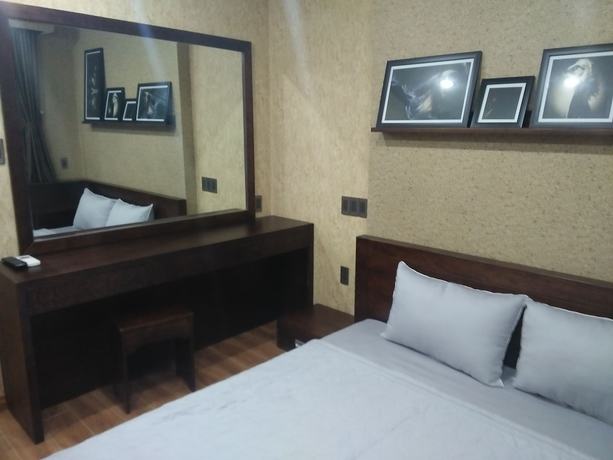 Imagen de la habitación del Hotel RandG Suite. Foto 7