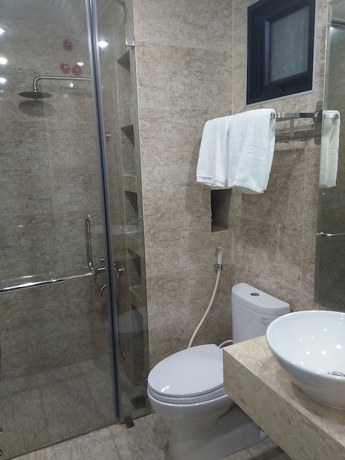 Imagen de la habitación del Hotel RandG Suite. Foto 13