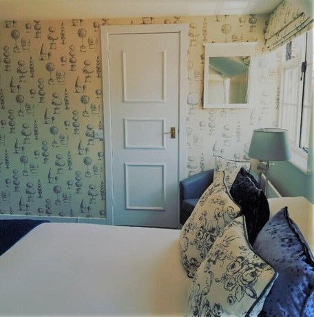 Imagen de la habitación del Hotel Random Hall. Foto 14