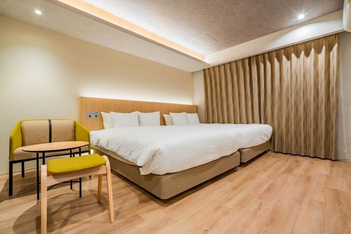 Imagen de la habitación del Hotel Randor Hiroshima Prestige. Foto 13