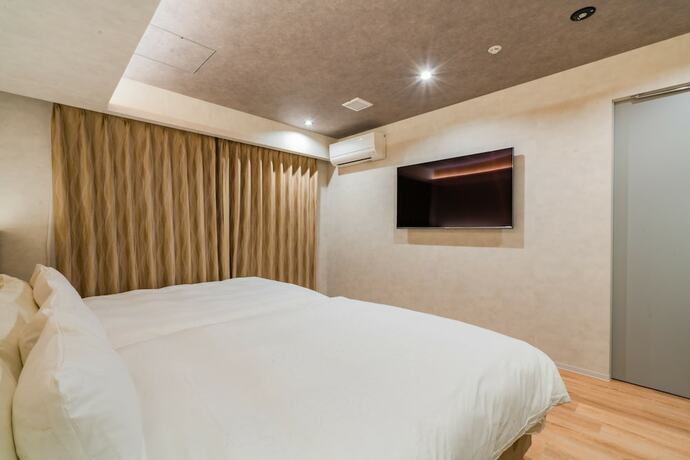 Imagen de la habitación del Hotel Randor Hiroshima Prestige. Foto 19