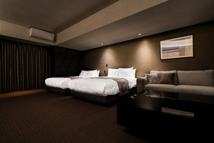 Imagen de la habitación del Hotel Randor Namba Osaka Suites. Foto 13