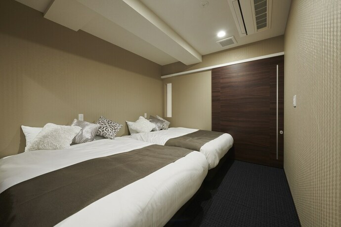 Imagen de la habitación del Hotel Randor Residence Susukino Suites. Foto 34