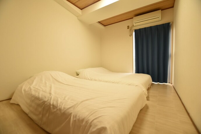 Imagen de la habitación del Hotel Randor Residence Tokyo Grand. Foto 22