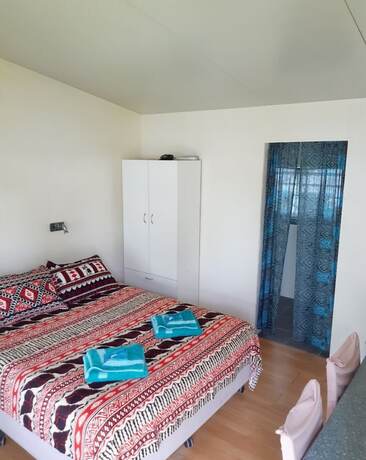 Imagen de la habitación del Hotel Ranginui\'s Retreat. Foto 17