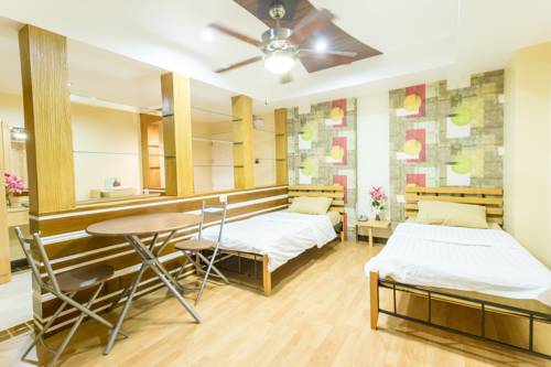 Imagen de la habitación del Hotel Rangsit Grand Condo. Foto 8