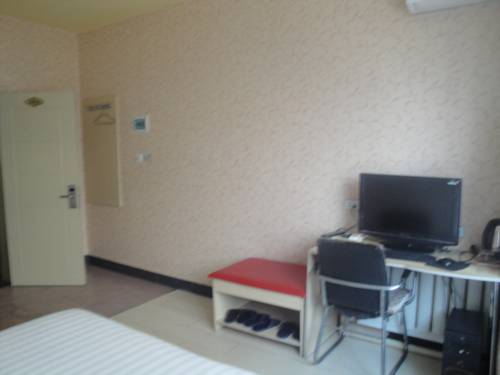 Imagen de la habitación del Hotel Ranti Mudanjiang. Foto 3