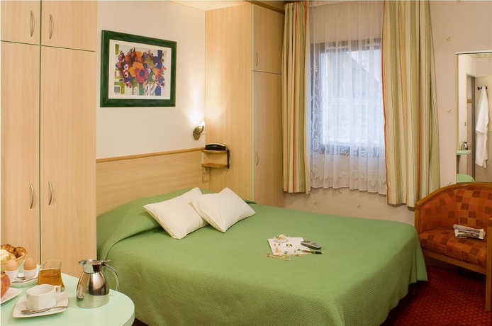 Imagen de la habitación del Hotel Rapp'hôtel. Foto 7