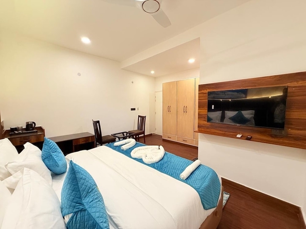 Imagen de la habitación del Hotel Rasa Boutique Stay. Foto 10