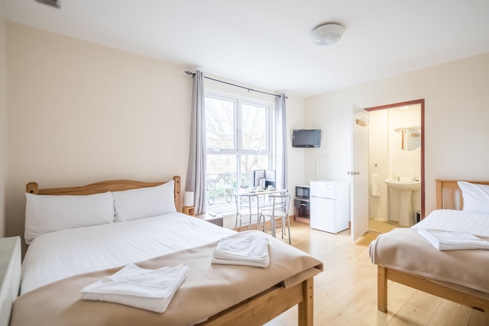 Imagen de la habitación del Hotel Rasa Sayang House. Foto 5