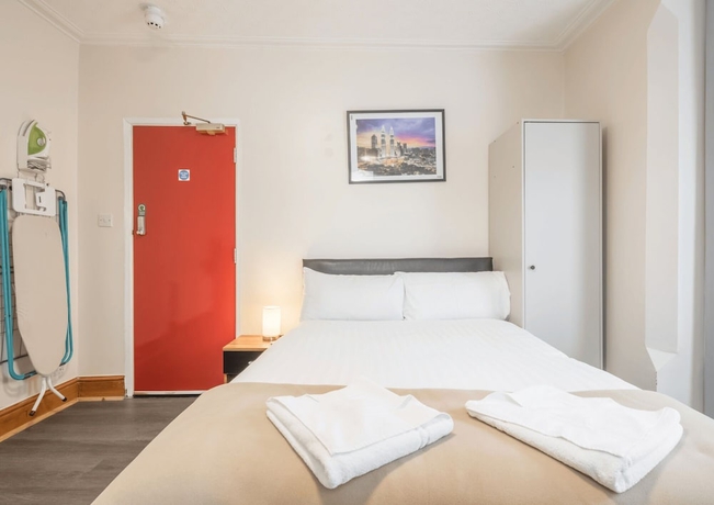 Imagen de la habitación del Hotel Rasa Sayang House. Foto 16