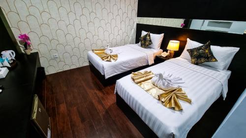 Imagen de la habitación del Hotel Rasamala. Foto 19
